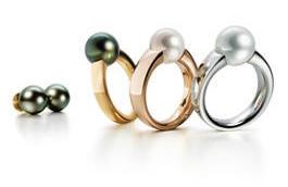 Ringen en oorhanger met parel